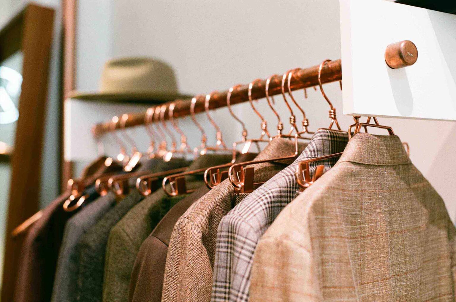 circular fashion - clothing hanging on hangers