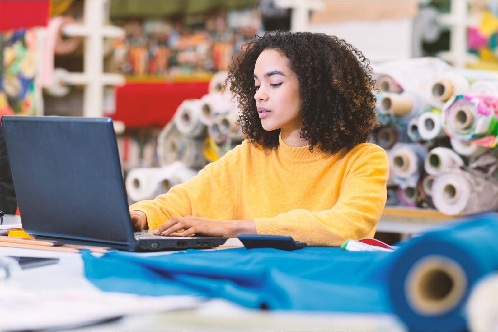 fashion designer using AI to source materials